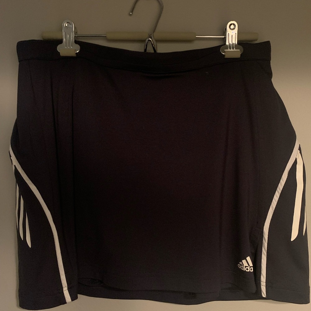 ADDIDAS SKORT SALE!  New  condition in Navy Blue size M!